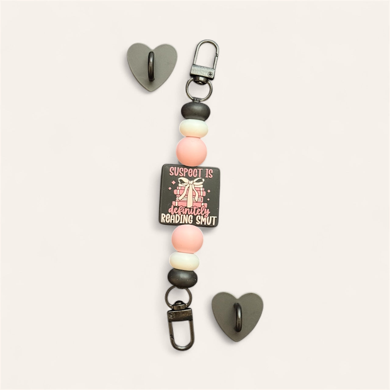 "Suspect Is Definitely Reading" Kindle & Phone Strap